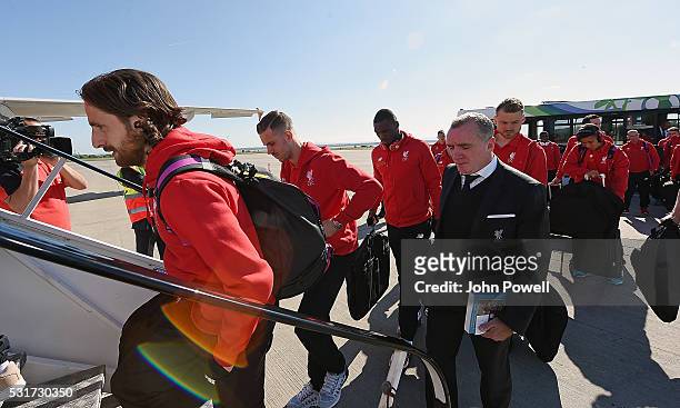 Jordan Henderson and Ian Ayre managing director of Liverpool boarding the flight on the way to Basel for the Europa League Final on May 16, 2016 in...