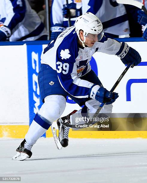 Matt Frattin of the Toronto Marlies skates up ice against the Albany Devils during AHL playoff game action on May 14, 2016 at Ricoh Coliseum in...