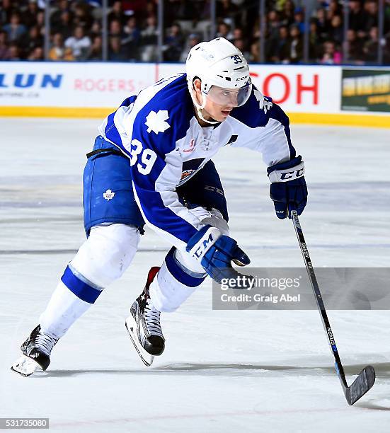 Matt Frattin of the Toronto Marlies skates up ice against the Albany Devils during AHL playoff game action on May 14, 2016 at Ricoh Coliseum in...