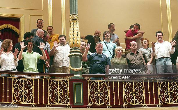 Gays celebrate 30 June 2005 in parliament in Madrid after the approval by deputies a law allowing homosexuals to marry and adopt children in Spain....