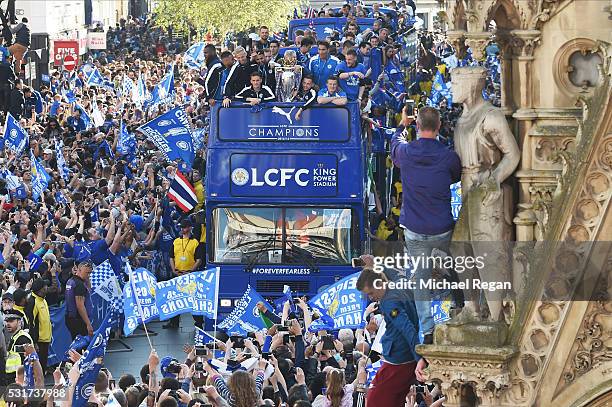 The Buses carrying the Leicester squad and trophy makes it's way through the the streets during the Leicester City Barclays Premier League winners...