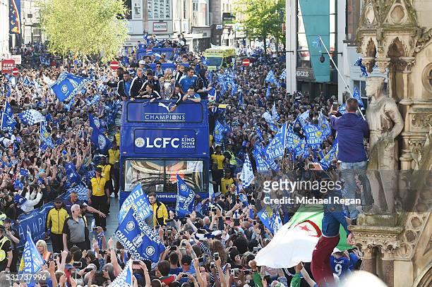 The Buses carrying the Leicester squad and trophy makes it's way through the the streets during the Leicester City Barclays Premier League winners...