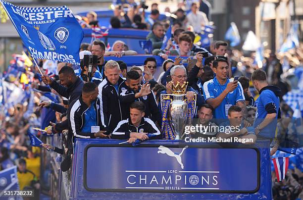 The Buses carrying the Leicester squad and trophy makes it's way through the the streets during the Leicester City Barclays Premier League winners...