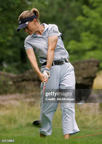 Catriona Matthew of Scotland hits her tee shot on the second hole during her match against A.J. Eathorne of Canada during the first round of the HSBC...