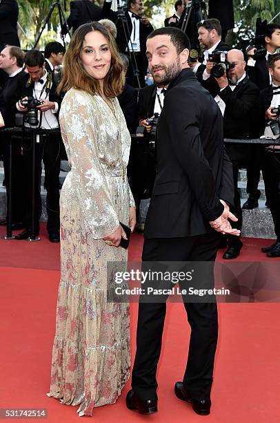 Alysson Paradis and Guillaume Gouix attend the "Loving" premiere during the 69th annual Cannes Film Festival at the Palais des Festivals on May 16,...