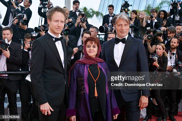Jury members Danish actor Mads Mikkelsen, Iranian producer Katayoon Shahabi and Hungarian director Laszlo Nemes attends the "Loving" premiere during...
