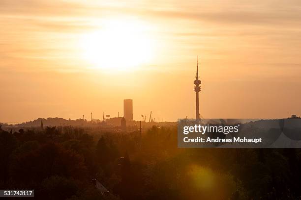 view to the olympic tower with ash cloud - olympiaturm stock-fotos und bilder