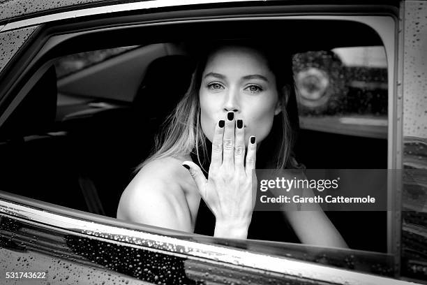 Doutzen Kroes departs the Martinez Hotel during the 69th annual Cannes Film Festival on May 11, 2016 in Cannes, France.