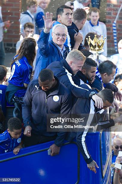 Wes Morgan, Riyad Mahrez, Kasper Schmeichel, coach Claudio Ranieri, Jamie Vardy, Andy King and Leonardo Ulloa of Leicester city on the Leicester City...