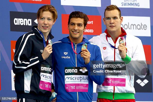 Henrik Christiansen of Norway, Gabriele Detti of Italy and Peter Bernek of Hungary pose on the podium after winning the Men's400m Freestyle Final on...