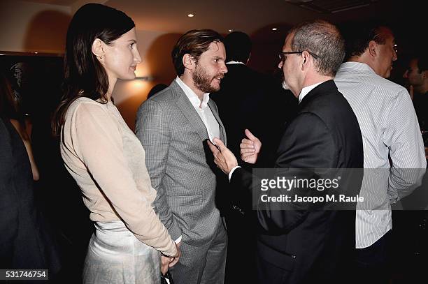 Felicitas Rombold, actor Daniel Bruhl and Raindance Film Festival's Elliot Grove attend IMDb's 2016 Dinner Party In Cannes at Restaurant Mantel on...
