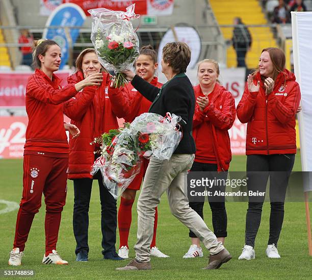 Raffaella Manieri, Fabienne Weber, Laura Feiersinger, Ricarda Walkling and Jenny Gaugigl of Bayern Muenchen receive flowers as they say goodbye...