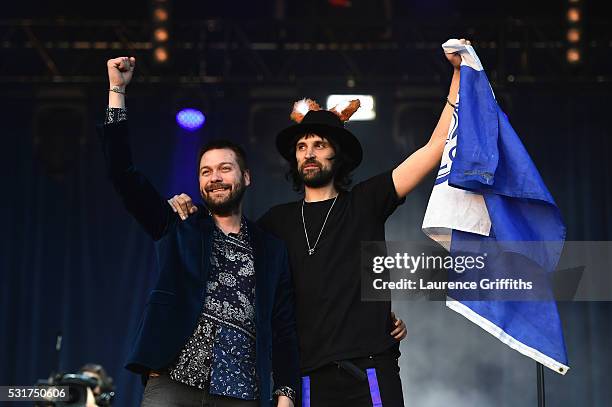 Tom Meighan and Sergio Pizzorno of Kasabian perform during the Leicester City Barclays Premier League winners bus parade on May 16, 2016 in...