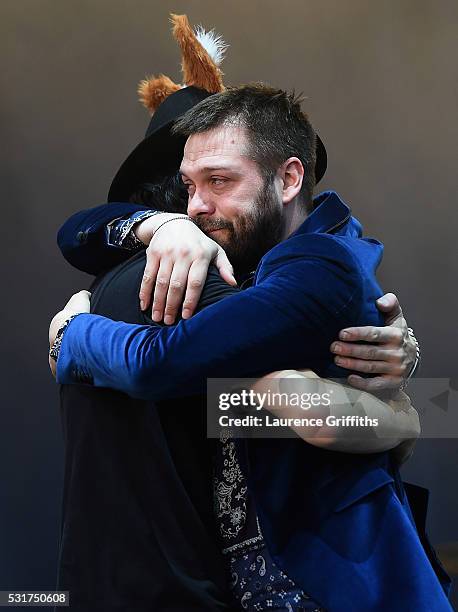 Tom Meighan and Sergio Pizzorno of Kasabian perform during the Leicester City Barclays Premier League winners bus parade on May 16, 2016 in...