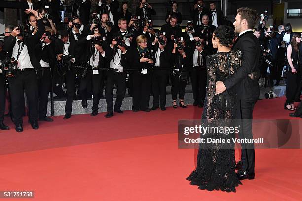 Actress Ruth Negga and Joel Edgerton leave the "Loving" premiere during the 69th annual Cannes Film Festival at the Palais des Festivals on May 16,...