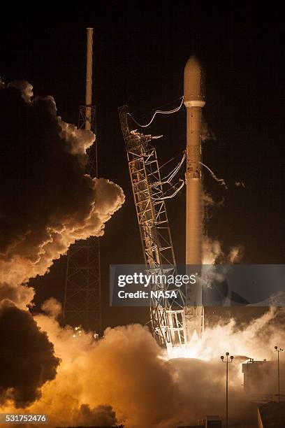 In this handout provided by the National Aeronautics and Space Administration , Falcon 9 lifts off with ORBCOMM-2 from SpaceX's launch pad at Cape...