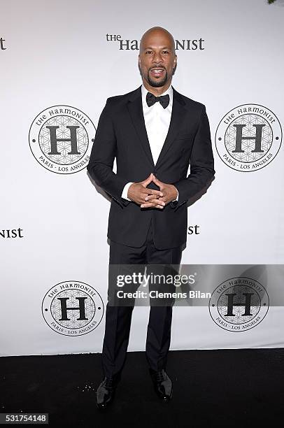 Common attends The Harmonist Cocktail Party during The 69th Annual Cannes Film Festival at Plage du Grand Hyatt on May 16, 2016 in Cannes.