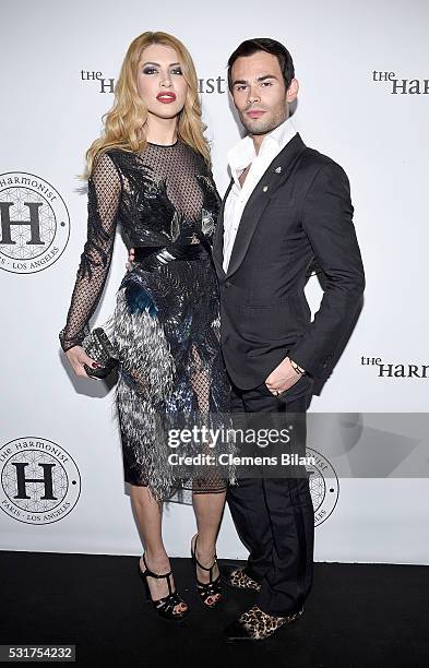 Mark-Francis Vandelli and guest attend The Harmonist Cocktail Party during The 69th Annual Cannes Film Festival at Plage du Grand Hyatt on May 16,...