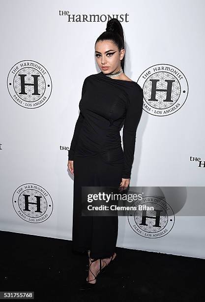Charli XCX attends The Harmonist Cocktail Party during The 69th Annual Cannes Film Festival at Plage du Grand Hyatt on May 16, 2016 in Cannes.