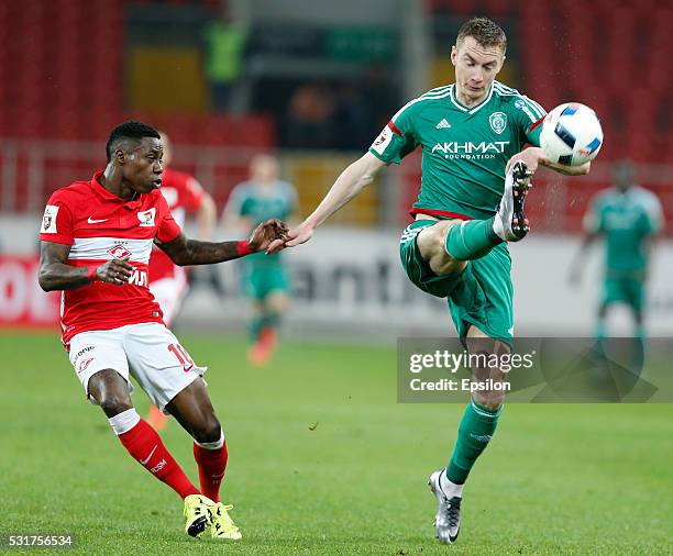 Quincy Promes of FC Spartak Moscow is challenged by Andrei Semyonov of FC Terek Grozny during the Russian Premier League match between FC Spartak...