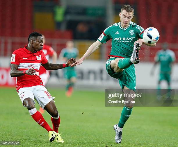 Quincy Promes of FC Spartak Moscow is challenged by Andrei Semyonov of FC Terek Grozny during the Russian Premier League match between FC Spartak...