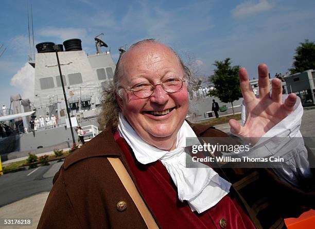 Ralph Archbold portrays Benjamin Franklin while welcoming the USS Cole into port June 30, 2005 in Philadelphia, Pennsylvania. The USS Cole, which was...