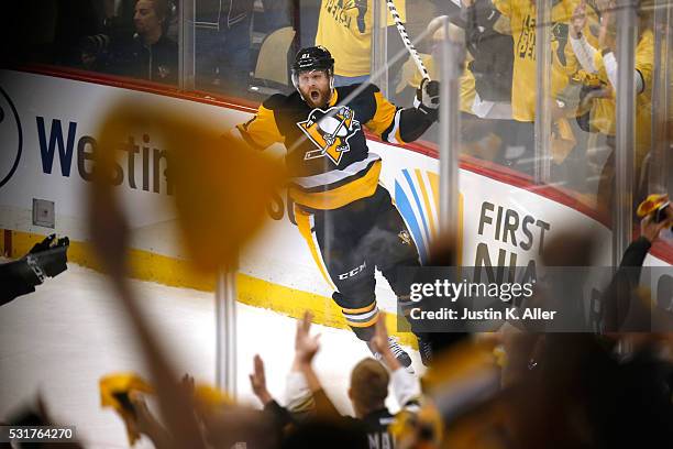Phil Kessel of the Pittsburgh Penguins celebrates after scoring a goal against Andrei Vasilevskiy of the Tampa Bay Lightning during the first period...