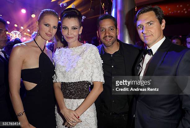 Karolina Kurkova, Lola Karimova-Tillyaeva, David Blaine and Archie Drury attend The Harmonist Cocktail Party during The 69th Annual Cannes Film...