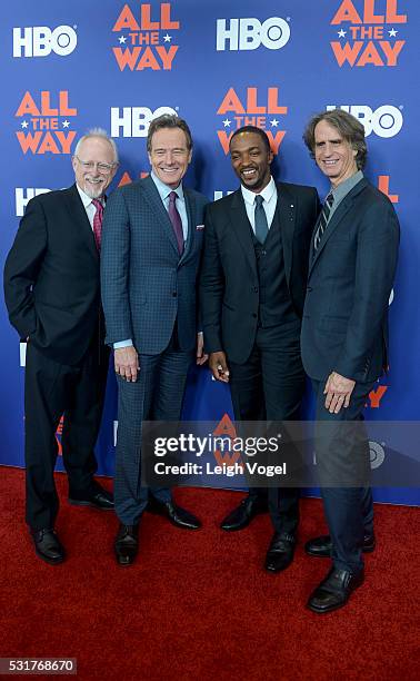 Robert Schenkkan, Bryan Cranston, Anthony Mackie and Jay Roach pose for photos on the red carpet during the HBO "All the Way" premiere at The...