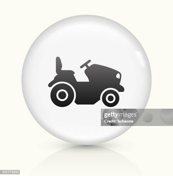 tractor icon on white round vector button - riding lawn mower stock illustrations