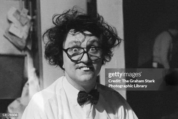 English comedian Ken Dodd shows off his trademark buck teeth and crazy hair, circa 1970.