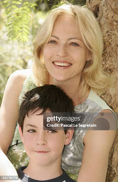 Actress Alexandra Vandernoot from "Carla Rubens" TV show poses with her son, Leo Uzan, during a photo call at the 45th Television Festival of Monte...