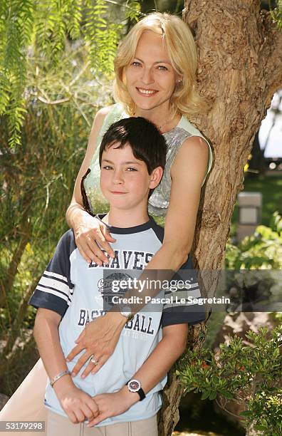 Actress Alexandra Vandernoot from "Carla Rubens" TV show poses with her son, Leo Uzan, during a photo call at the 45th Television Festival of Monte...