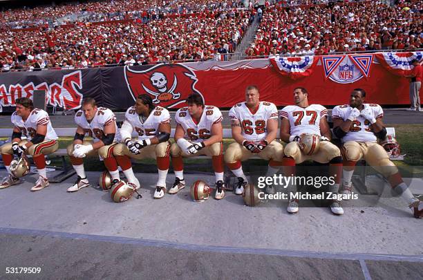 Members of the San Francisco 49ers offensive line, including Scott Gragg, Ron Stone, Eric Heitmann, Jeremy Newberry, Matt Willig and Derrick Deese...