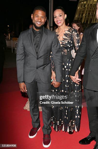 Usher and his wife Grace Miguel leave the "Hands Of Stone" premiere during the 69th annual Cannes Film Festival at the Palais des Festivals on May...