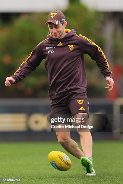 Assistant coach Chris Newman traps a ball soccer style during a Hawthorn Hawks AFL training session at Waverley Park on May 17, 2016 in Melbourne,...