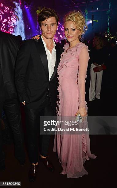Oliver Cheshire and Pixie Lott attend the Chopard Wild Party during the 69th Annual Cannes Film Festival at Port Canto on May 16, 2016 in Cannes.