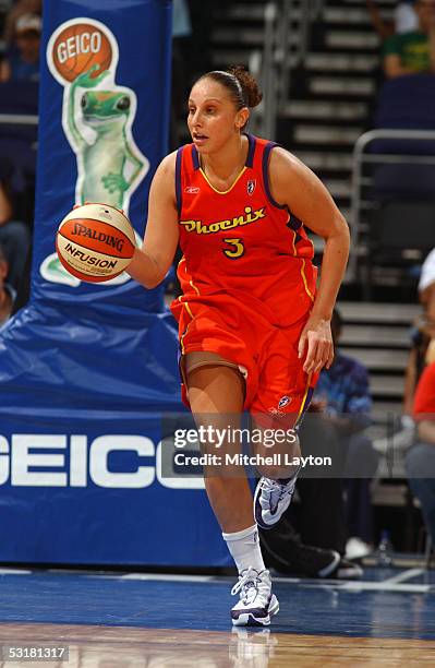 Diana Taurasi of the Phoenix Mercury brings the ball up court against the Washington Mystics during a WNBA game June 21, 2005 at the MCI Center in...