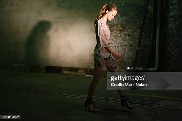 Model prepares backstage ahead of the Bec & Bridge show at Mercedes-Benz Fashion Week Resort 17 Collections at Carriageworks on May 17, 2016 in...
