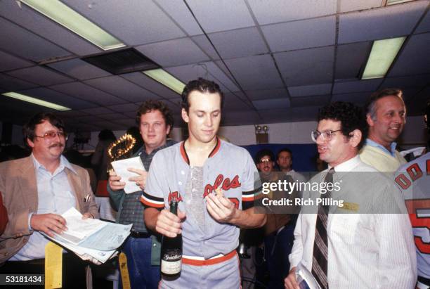 Cal Ripken, Jr. #8 of the Baltimore Orioles celebrates in the locker room after the Orioles win the 1983 World Series defeating the Philadelphia...