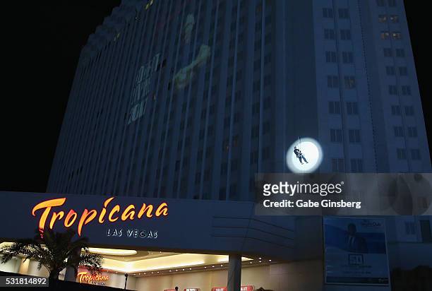 Chef Robert Irvine rappels down the side of the Tropicana Las Vegas to announce his new restaurant concept at the Tropicana Las Vegas on May 16, 2016...
