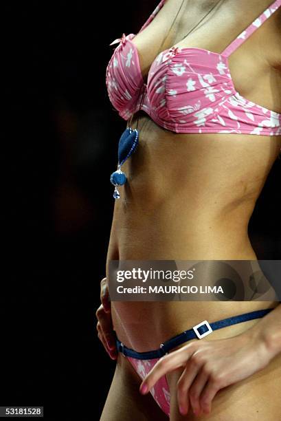 Model presents an outfit created by Agua Doce for the 2006 Spring-Summer collection, during Sao Paulo's Fashion Week, in Sao Paulo, Brazil, 01 July...