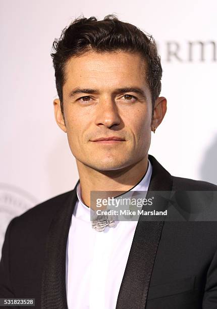 Orlando Bloom attends The Harmonist Cocktail Party during The 69th Annual Cannes Film Festival at Plage du Grand Hyatt on May 16, 2016 in Cannes.