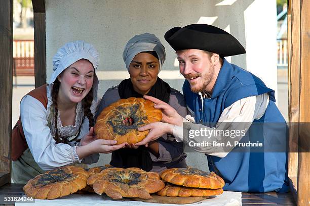 Nadiya Hussain poses with a Great Fire of London inspired bake during a photocall opening a new experience at The London Dungeon, which marks the...