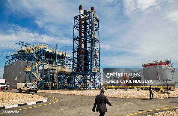 This photo shows the shore-based KivuWatt power production facility ...