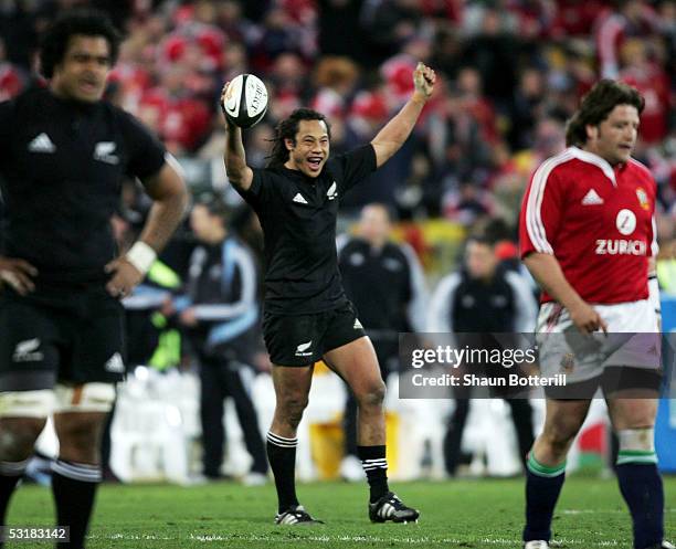 Tana Umaga the captain of the All Blacks celebrates at the final whistle of the second test match between New Zealand All Blacks and British and...