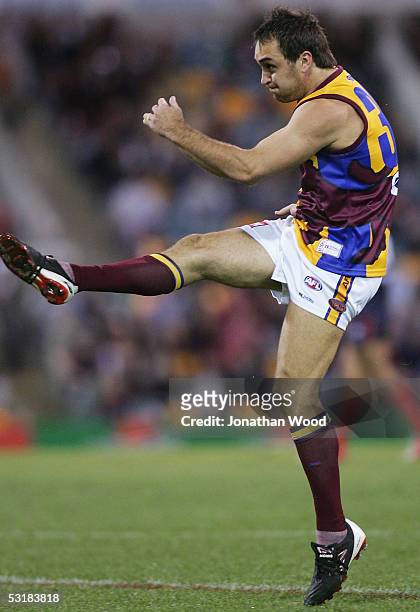 Daniel Bradshaw of the Lions kicks for goal during the Round 14 AFL match between the Brisbane Lions and Melbourne Demons at the Gabba on July 2,...