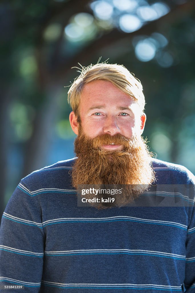 Mid adult man with a long beard