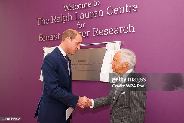 Prince William, Duke of Cambridge and Ralph Lauren unveil a plaque during a visit to the Royal Marsden NHS Foundation Trust, in Chelsea, west London,...