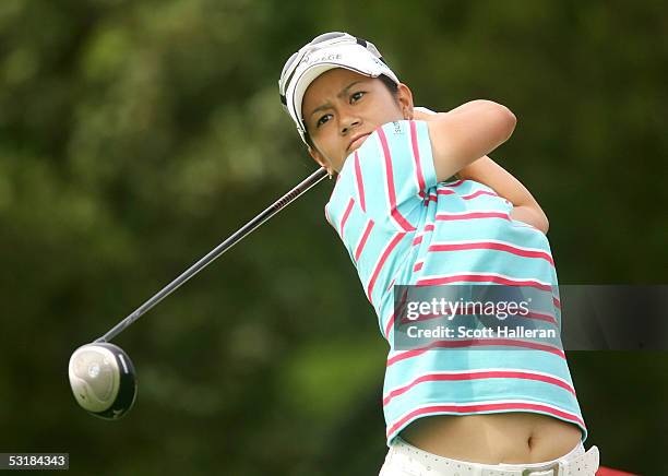 Ai Miyazato of Japan watches her tee shot the ninth hole during her match with Sophie Gustafson of Sweden during the third round of the HSBC World...